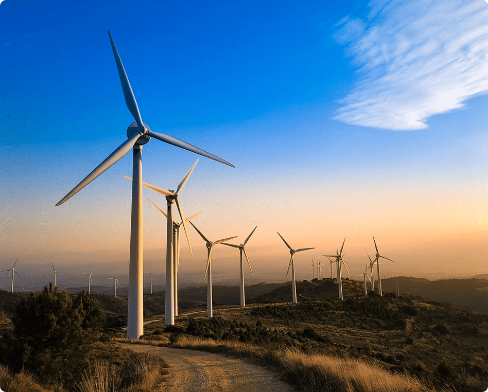 Windmills under a clear blue sky