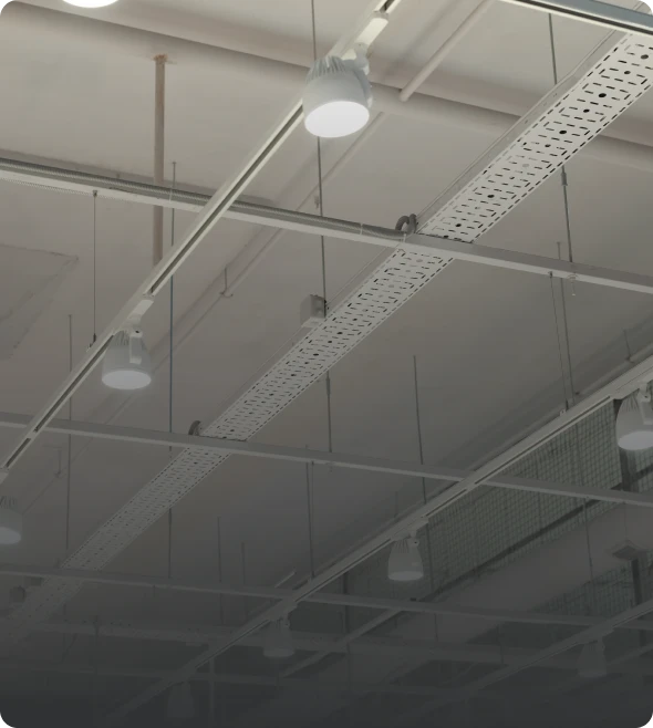 Overhead view of ceiling lights and ducts